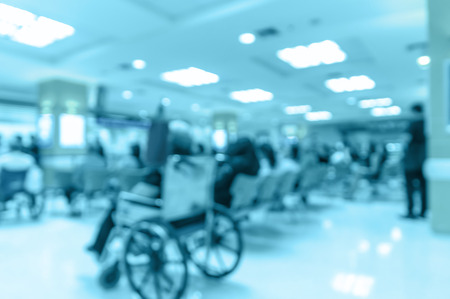 Abstract photo blurred of hospital background, Patient sitting chair with waiting seat for see doctor.の写真素材