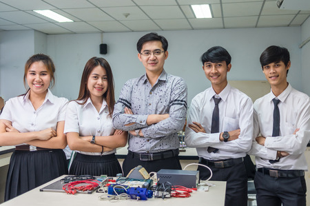 Portrait of Asian teacher and College Students in the laboratory classroom, University education conceptの写真素材