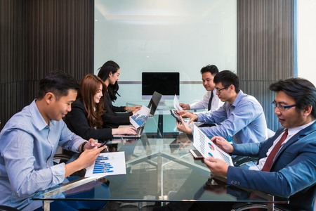 Group Of AsianBusiness people in casual suit working and meeting with happiness action in the modern Office, people business group conceptの写真素材
