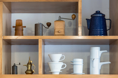 Coffee shop interior and accessories in the shelf for decorateの写真素材