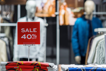 sale 40% off mock up advertise display frame setting over the clothes line in the shopping...