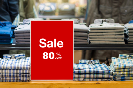 sale 80 off mock up advertise display frame setting over the stack of jeans and clothes line in the shopping department store for shopping, business fashion and advertisement concept0 off mock up advertise display frame setting over the stack of shirt in the shopping department store for shopping, business fashion and advertisement conceptの写真素材