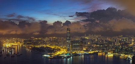 Panorama scene of Hong Kong Cityscape building river side from top view at the sunrise time