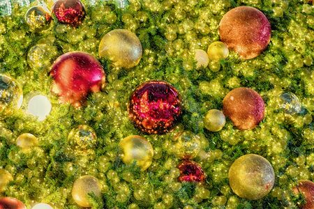Christmas Tree background over the abstract blurred bokeh, xmas and new year celebration conceptの写真素材