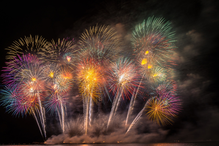Fantastic Multicolor Firework Celebration from the big boat over the sea, celebration conceptの写真素材