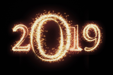 2019 written with Sparkle firework on dark background, Happy new year celebration and greeting cards conceptの写真素材