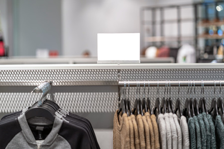 Sale off mock up advertise display frame setting over the clothes line in the shopping department store for shopping, business fashion and advertisement conceptの写真素材