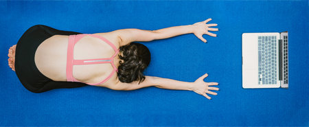 Banner Asian woman practicing yoga from home with laptop when Covid19 outbreak, healthy or...