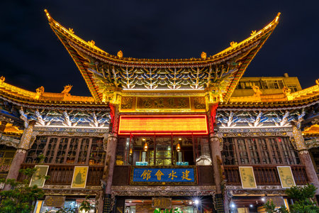 KUNMING, CHINA - OCT 2019 : Scene of China temple or pagoda with Night market around Jinbi Square on October 27, 2019 at Kunming,China.travel and tourism,famous and landmark conceptのeditorial素材