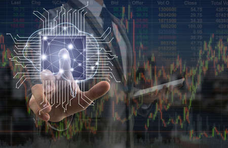 Double exposure of Businessman pointing the Artificial intelligence of brain technology over Stock...