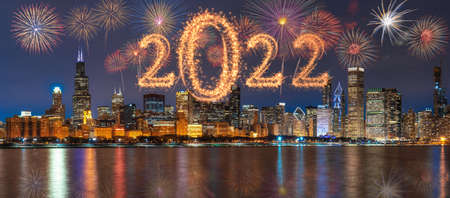 2022 written with Sparkle firework with multicolor of fireworks on Panorama scene of Chicago cityscape river side along Lake Michigan background, USA skyline,Happy new year and merry Christmas conceptの写真素材
