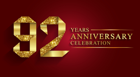 92 years anniversary celebration greeting. Ribbon golden number on red background.Numbers ribbon gold foil.のイラスト素材