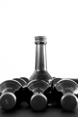 small bottles in black and white 