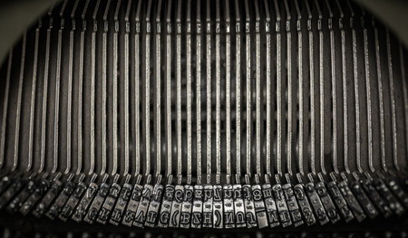 Details of type hammers inside a typewriterの写真素材