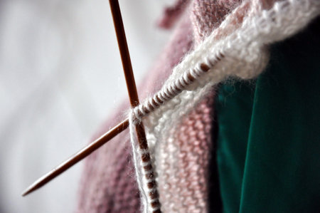 knitting with a knitted sweater of woolen fluffy threads