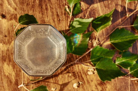 Glasses of birch sap juice birch branches on wooden table background. Healthy and vitamin food spring useful vitamin nutrition fresh drink.の写真素材