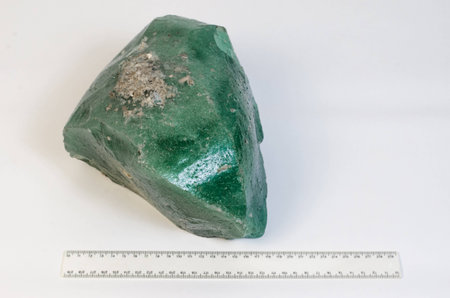 Big natural stone green amber white backgroundの写真素材