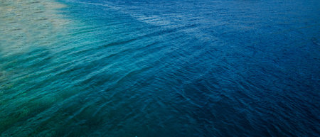 Water in the sea ocean blue waves calm rest comfort outdoor nature aqua background view sunny tropical dayの写真素材