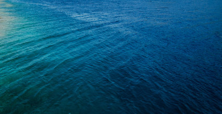 Water in the sea ocean blue waves calm rest comfort outdoor nature aqua background view sunny tropical dayの写真素材