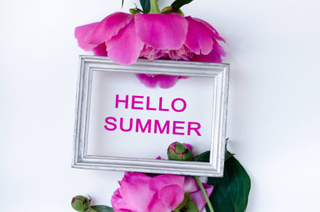 Pink peony flower in frame Flat lay Nature concept on white background with copy space for greeting message creative layout. Mother's Day and spring background concept.の写真素材
