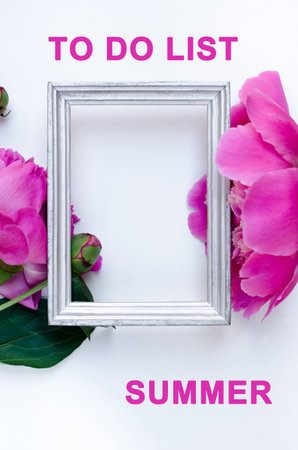 Pink peony flower in frame Flat lay Nature concept on white background with copy space for greeting message creative layout. Mother's Day and spring background concept.の写真素材