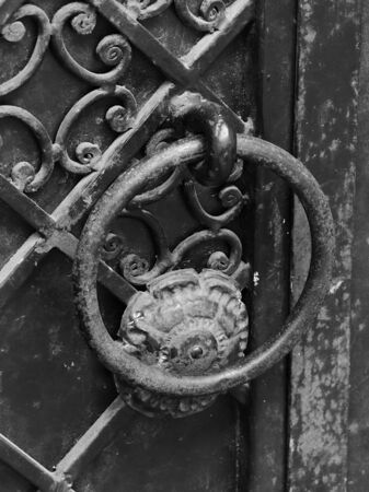 Door bell in the form of a metal ring.の写真素材