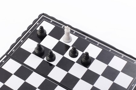 Five white pawnes alone mate the black kingの写真素材