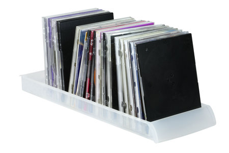  disks rest under the light background の写真素材