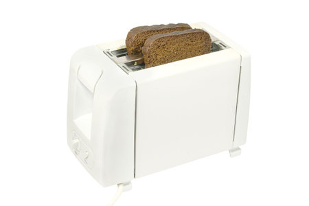 The image of toaster under the light background 