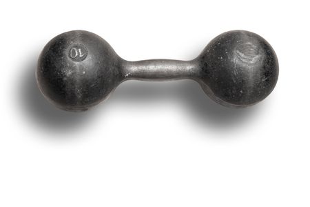 a dumbbell under the light background の写真素材