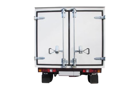 The image of close back doors of van under the white backgroundの写真素材