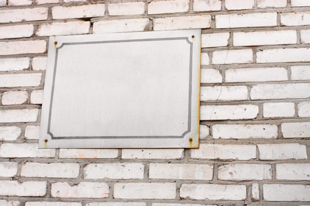 The image of signboard on the brick wallの写真素材