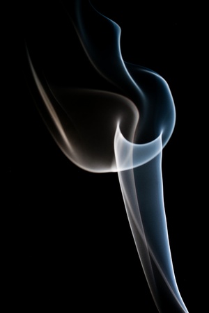 The image of smoke under the dark backgroundの写真素材