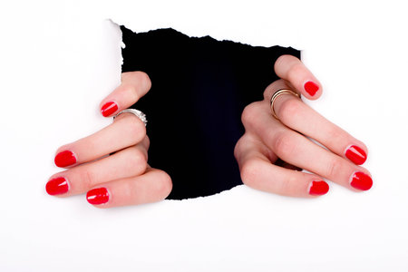 woman hands get out from the hole