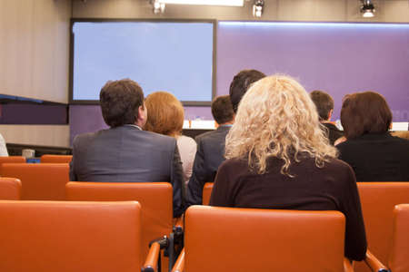 The audience listens to the acting in a conference hall.のeditorial素材