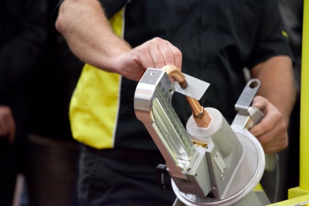 Welder welds with  welding machineの写真素材