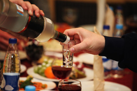 Somebody pours somebody some wineの写真素材