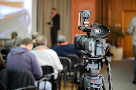 The audience listens to the acting in a conference hall.の写真素材
