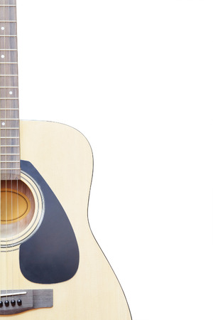 The image of acoustic guitar under the white backgroundの写真素材