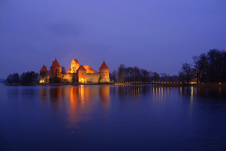 Lithuania, Trakai - November 17, 2014: Trakai Castle at night - Island castle in Trakai is a museum and a cultural center.のeditorial素材