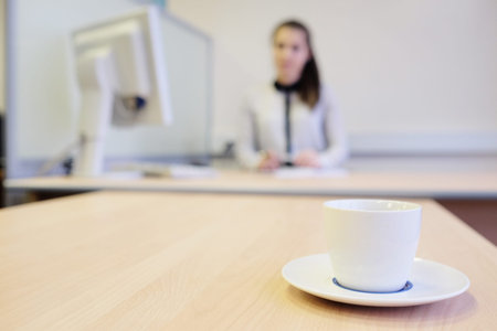 Girl secretary in an officeの写真素材