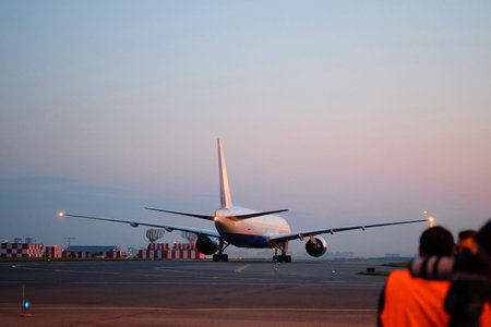 the image of a Passenger planes at the airport in the evening