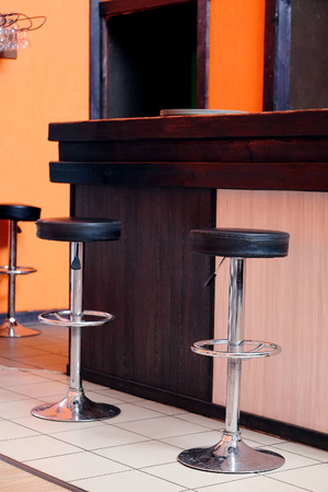 Chairs in row in barの写真素材