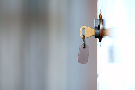 key in the door of the motel room