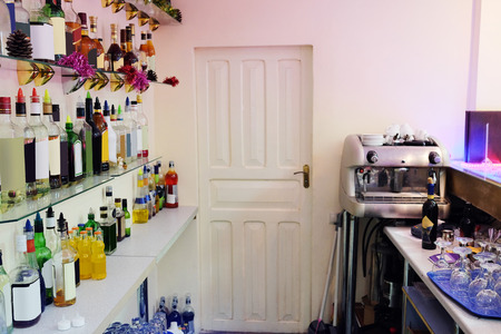 Assorted colorful bottles of alcoholic drinks in a barのeditorial素材