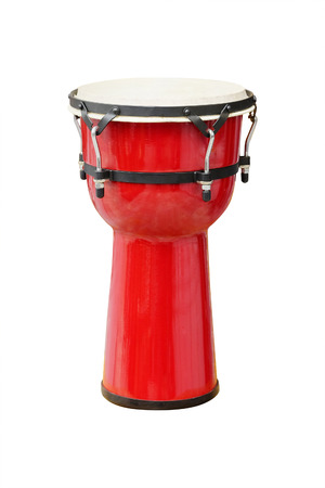 Image of red ethnic african drum under the white backgroundの写真素材