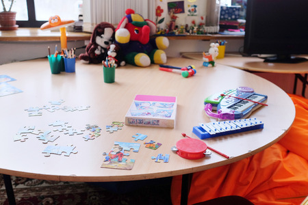Empty children's playroom.  Puzzles on the tableのeditorial素材