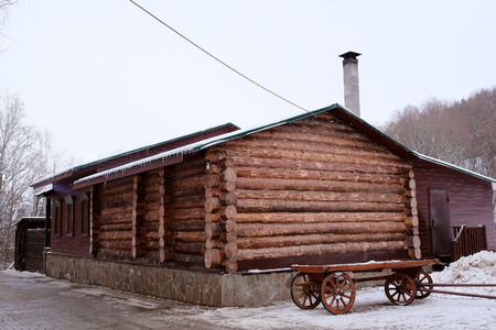 Log house with a cartのeditorial素材