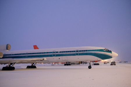 Moscow, Russia, February, 09,2015: commercial airplane parking at the airport in winterのeditorial素材