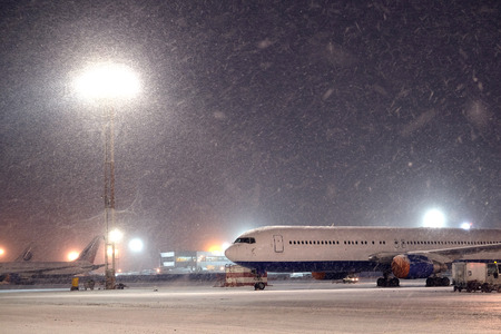 Moscow, Russia, February, 09,2015: commercial airplane parking at the airport in winterのeditorial素材